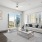 a living room with a couch and rug