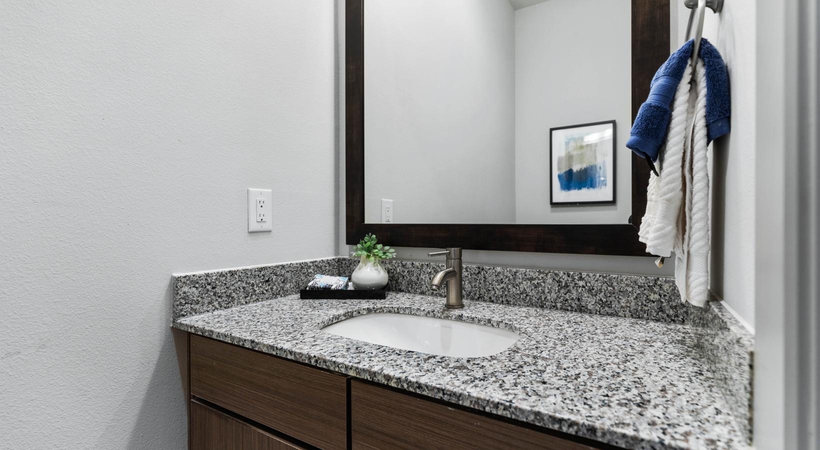 Bathroom options with thoughtful details a bathroom with a marble countertop