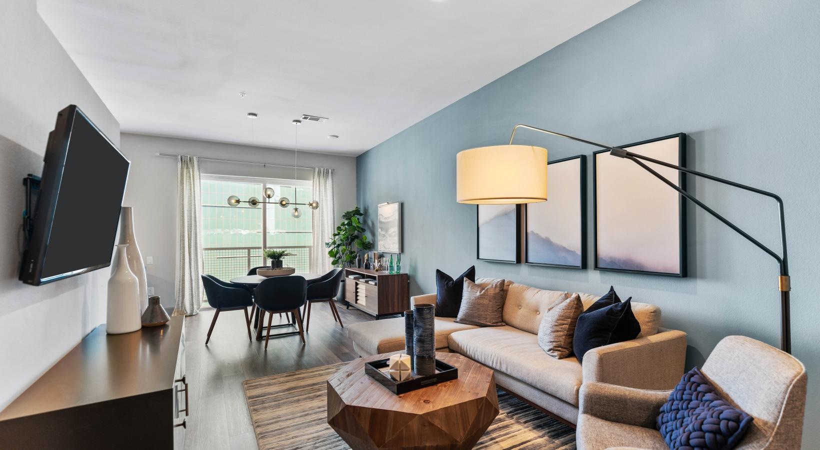 The essence of exceptional living a living room with a tv and couches