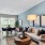 a living room with a tv and couches