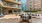 a courtyard with tables and chairs