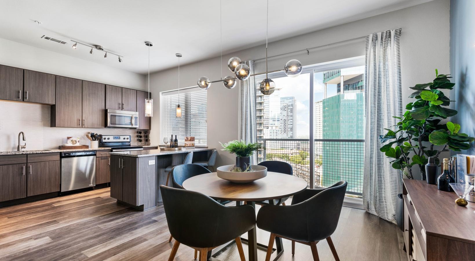 Find your perfect fit at Miro a kitchen with a dining table and chairs